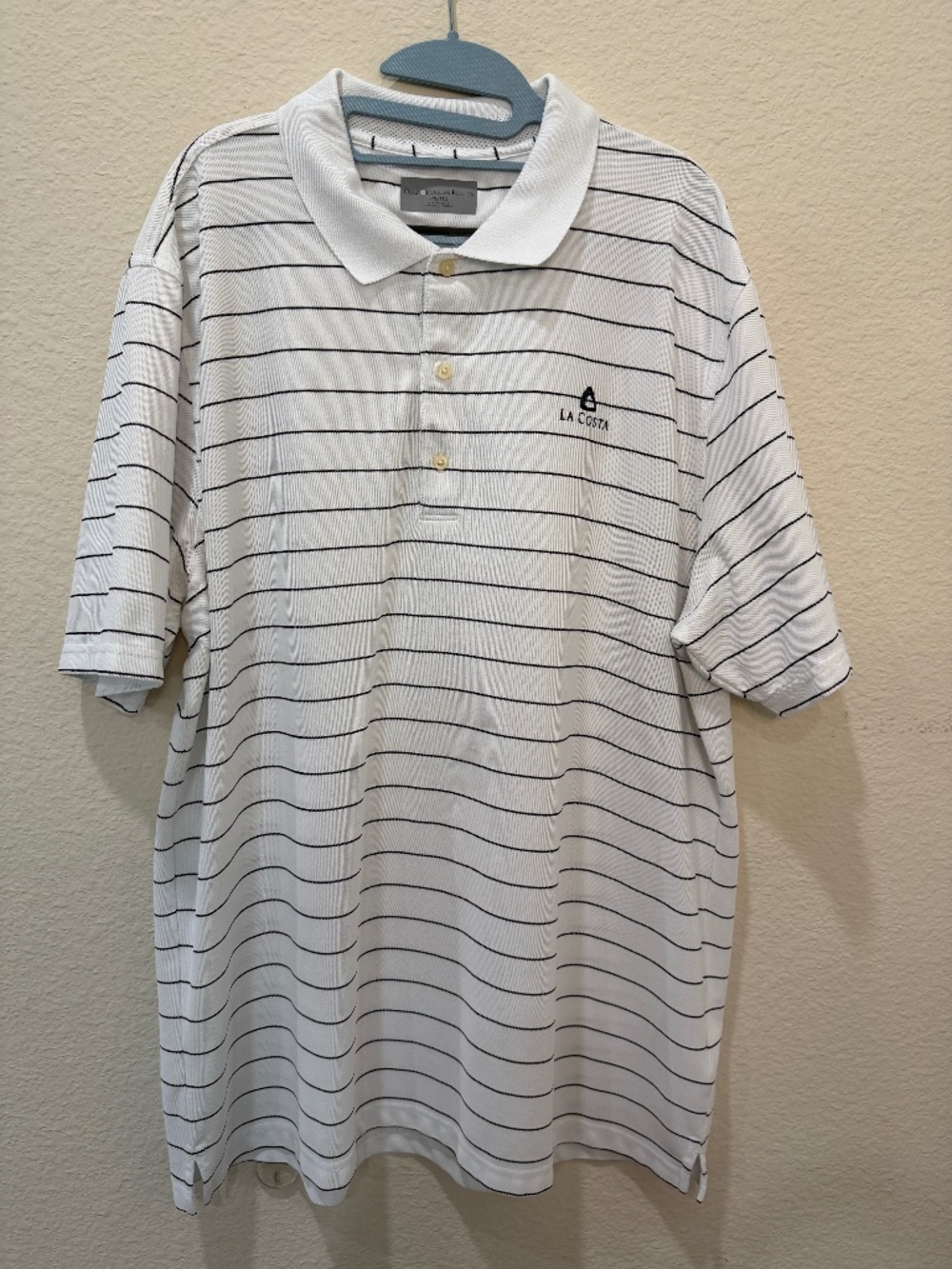 Men’s Omni Hotels & Resorts golf polo shirt